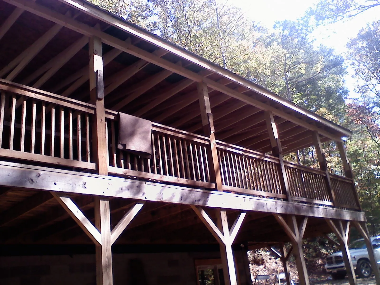 Timber framing under a new elevated porch and deck — Roof Leak Repair in Camden Point by Roofing Brothers